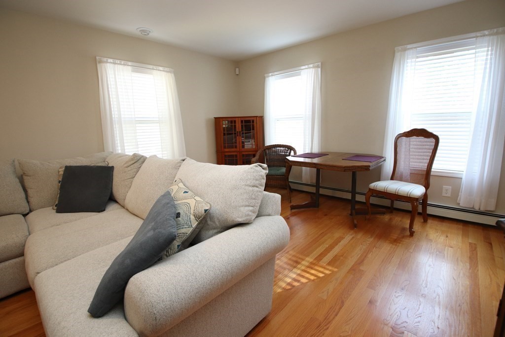 10 Pace Road Saugus, MA 01906 - Photo 13 of 42 a living room with furniture and a wooden floor
