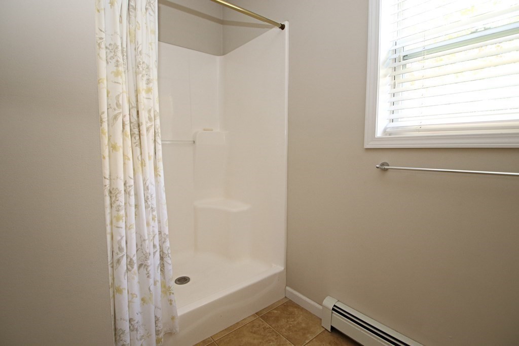 10 Pace Road Saugus, MA 01906 - Photo 19 of 42 a bathroom with a window