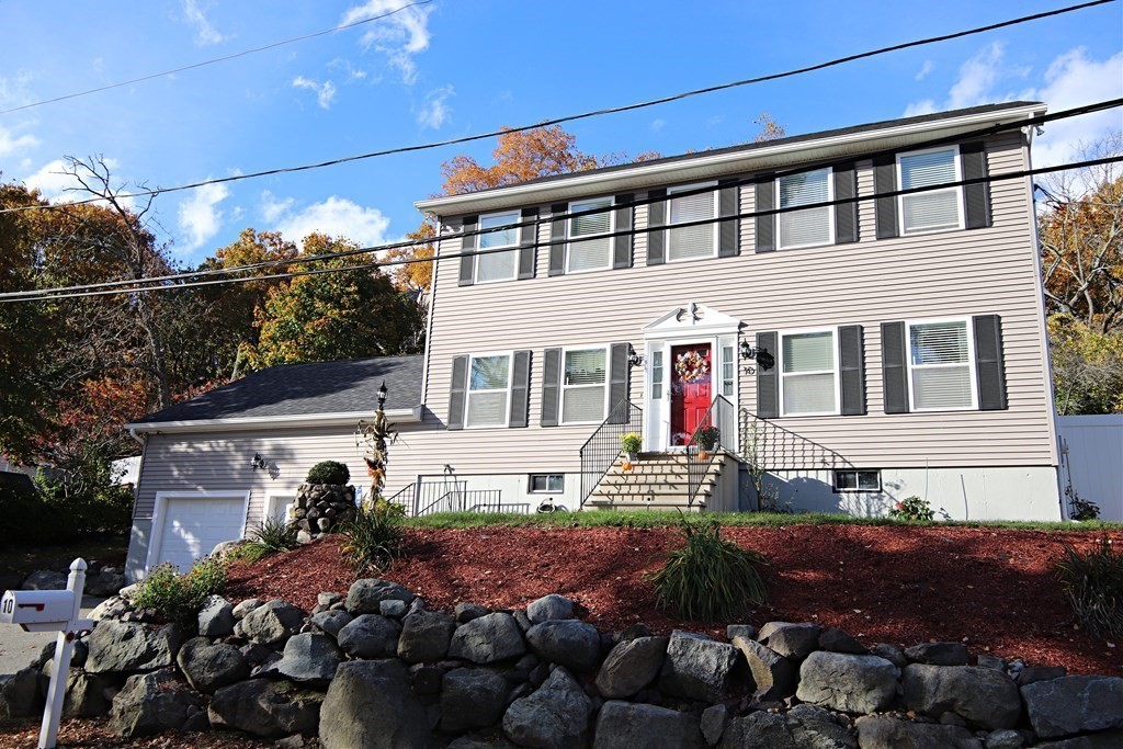 10 Pace Road Saugus, MA 01906 - Photo 2 of 42 a front view of a house with garden