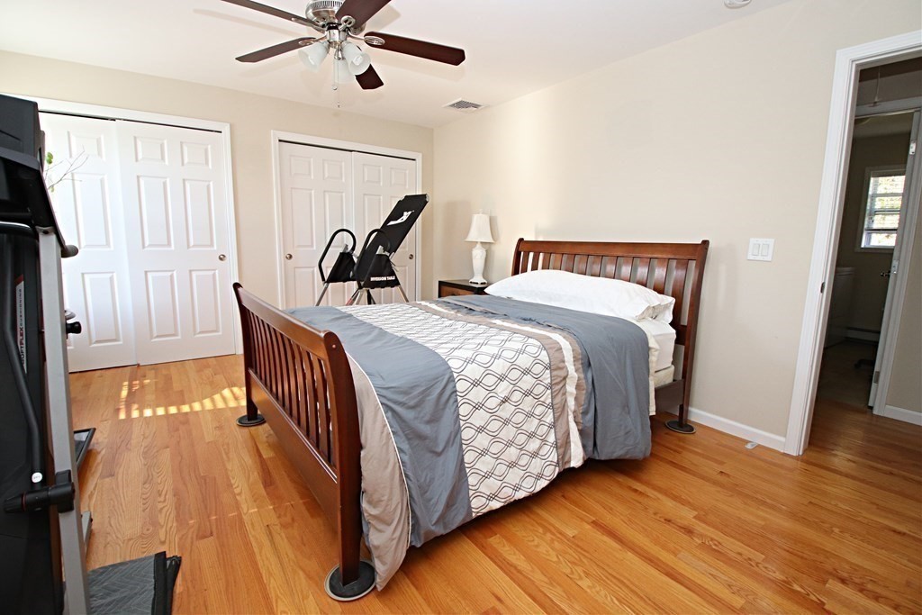 10 Pace Road Saugus, MA 01906 - Photo 27 of 42 a bedroom with bed and wooden floor