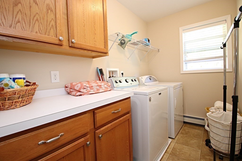 10 Pace Road Saugus, MA 01906 - Photo 31 of 42 a utility room with sink dryer and washer