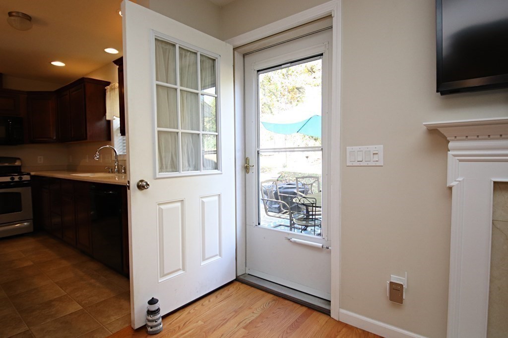 10 Pace Road Saugus, MA 01906 - Photo 39 of 42 a view of a kitchen with microwave and cabinets
