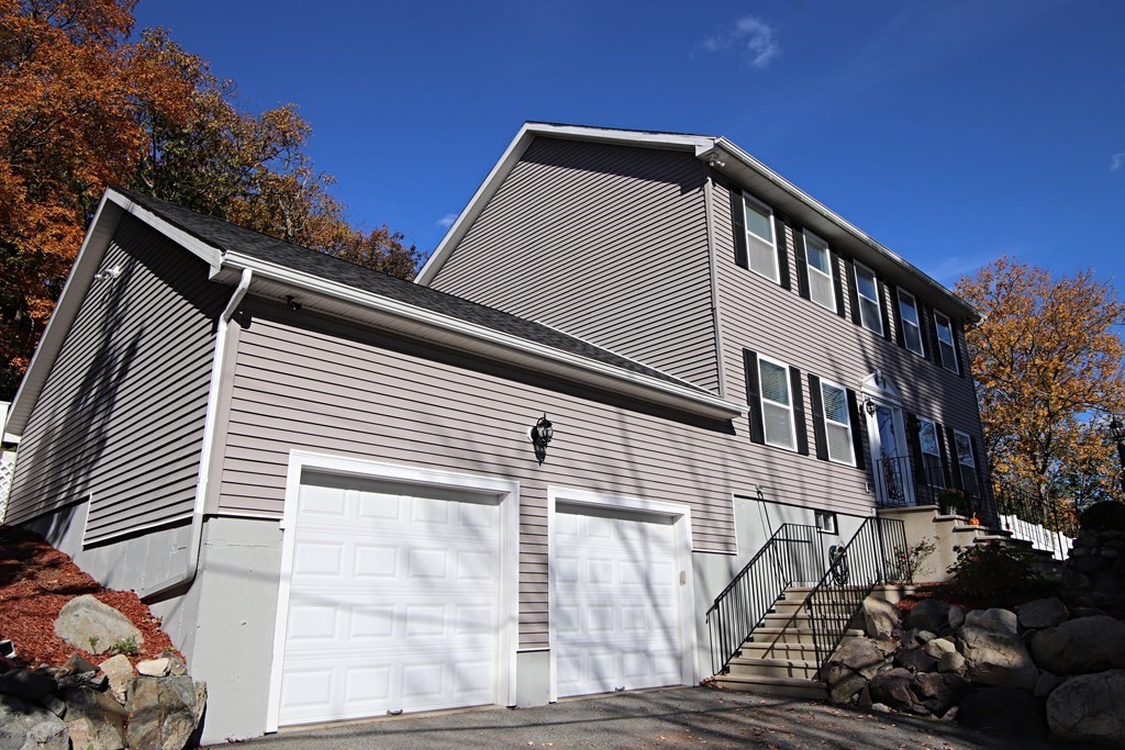 10 Pace Road Saugus, MA 01906 - Photo 4 of 42 a view of a house with a street