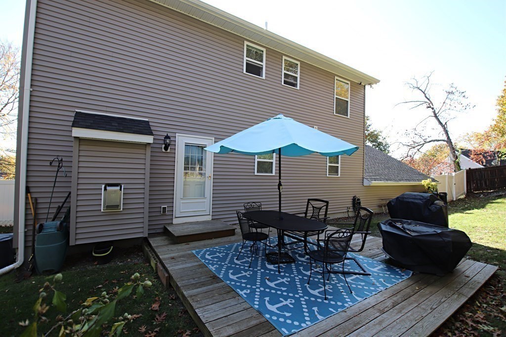 10 Pace Road Saugus, MA 01906 - Photo 41 of 42 a view of a chairs and a table in the patio