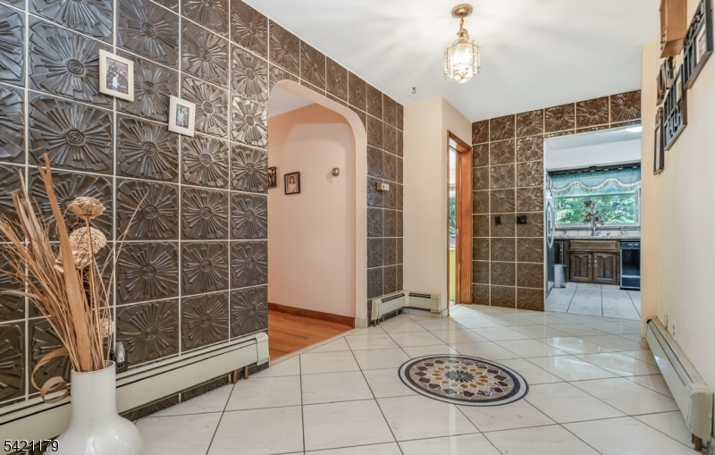 1868 Amwell Road Somerset, NJ 08873 - Photo 3 of 20 a view of a door and chair in a room