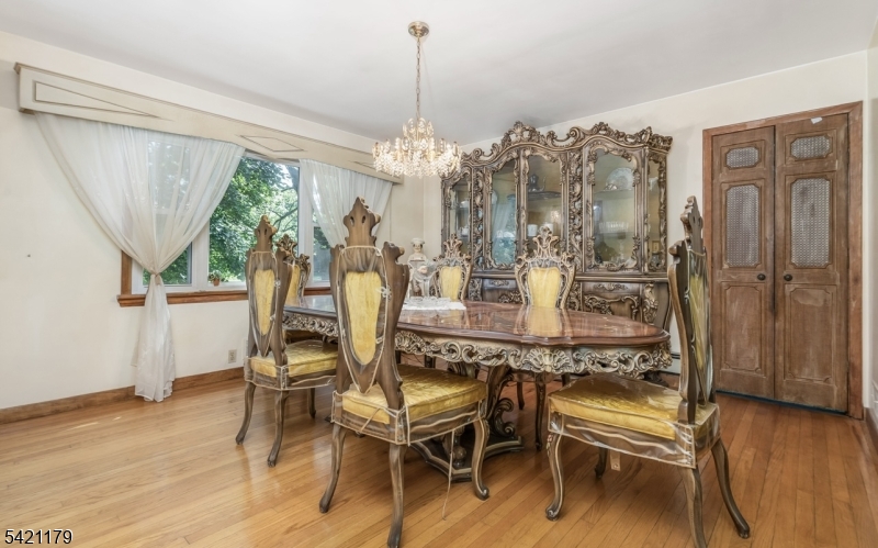 1868 Amwell Road Somerset, NJ 08873 - Photo 6 of 20 a view of a dining room with furniture window and wooden floor