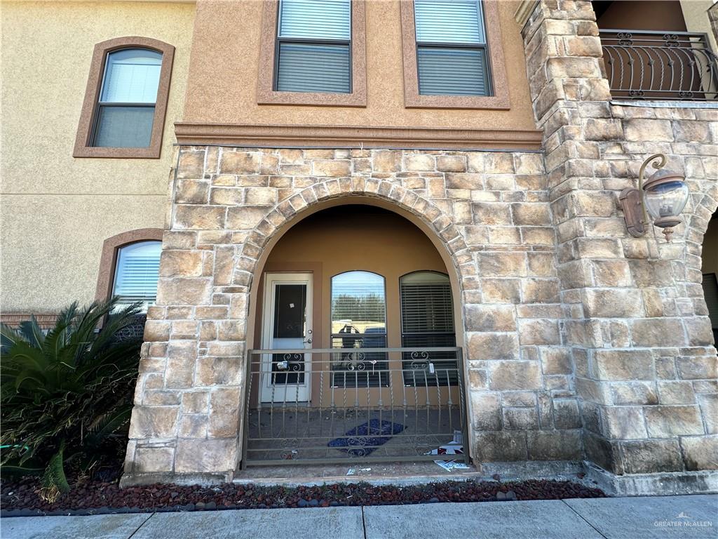 2715 Mimosa Street, Unit 3 Mission, TX 78574 - Photo 2 of 13 a front view of a house with garden