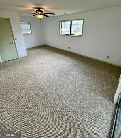 a view of a room with natural light