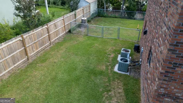 a view of a backyard with plants
