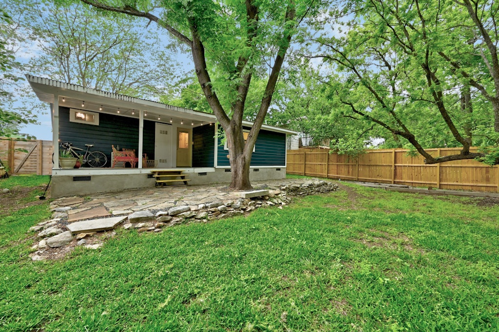 4025 Valley View Road, Unit 2 Austin, TX 78704 - Photo 19 of 19 a view of a house with backyard and a tree