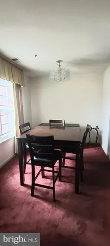 a view of a workspace with furniture