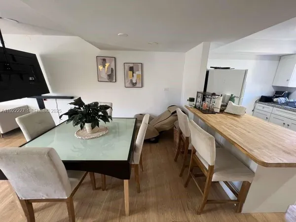 a view of a dining room and livingroom