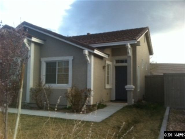 1708 Trek Trail Reno, NV 89521 - Photo 2 of 10 a view of a house with backyard