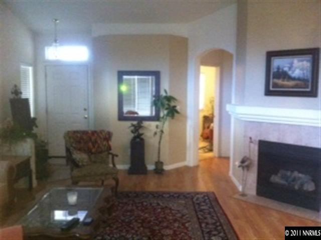 1708 Trek Trail Reno, NV 89521 - Photo 8 of 10 a living room with furniture and a fireplace