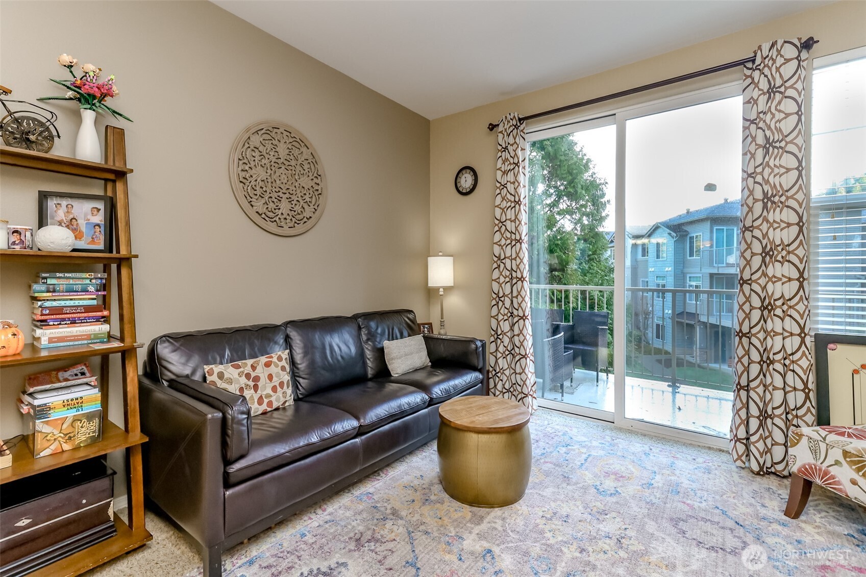 15325 Southeast 155th Place, Unit I3 Renton, WA 98058 - Photo 5 of 31 a living room with furniture a rug and a window