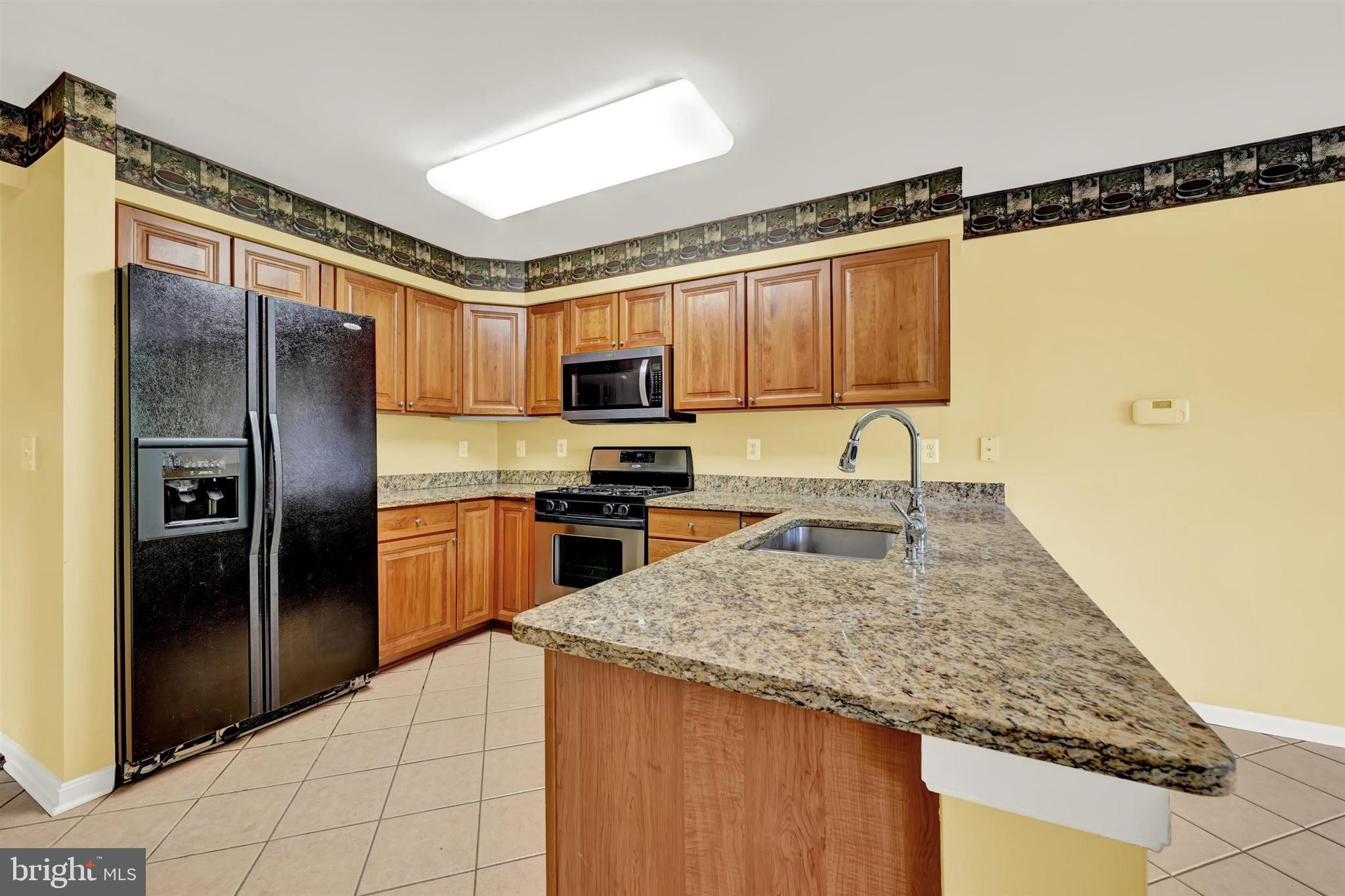 12021 Tralee Road, Unit 402 Lutherville-Timonium, MD 21093 - Photo 15 of 36 Kitcehn