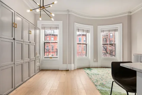 a view of living room with washer and dryer