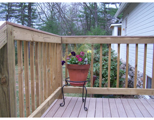 19 Hiley Brook Road Stow, MA 01775 - Photo 2 of 5 a view of a balcony with furniture
