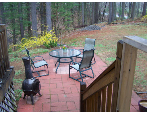19 Hiley Brook Road Stow, MA 01775 - Photo 5 of 5 a view of an outdoor sitting area with chairs
