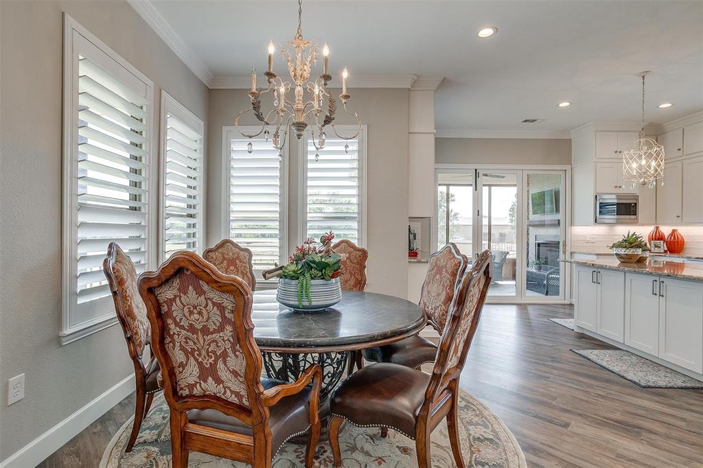 8650 South Fm 730 Boyd, TX 76023 - Photo 12 of 40 Dining area featuring crown molding, a chandelier, and wood-type flooring