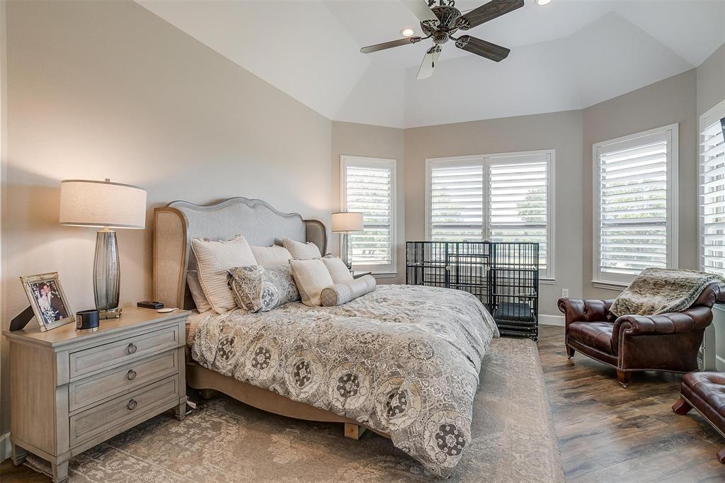 8650 South Fm 730 Boyd, TX 76023 - Photo 20 of 40 Bedroom with ceiling fan, vaulted ceiling, and dark hardwood / wood-style flooring