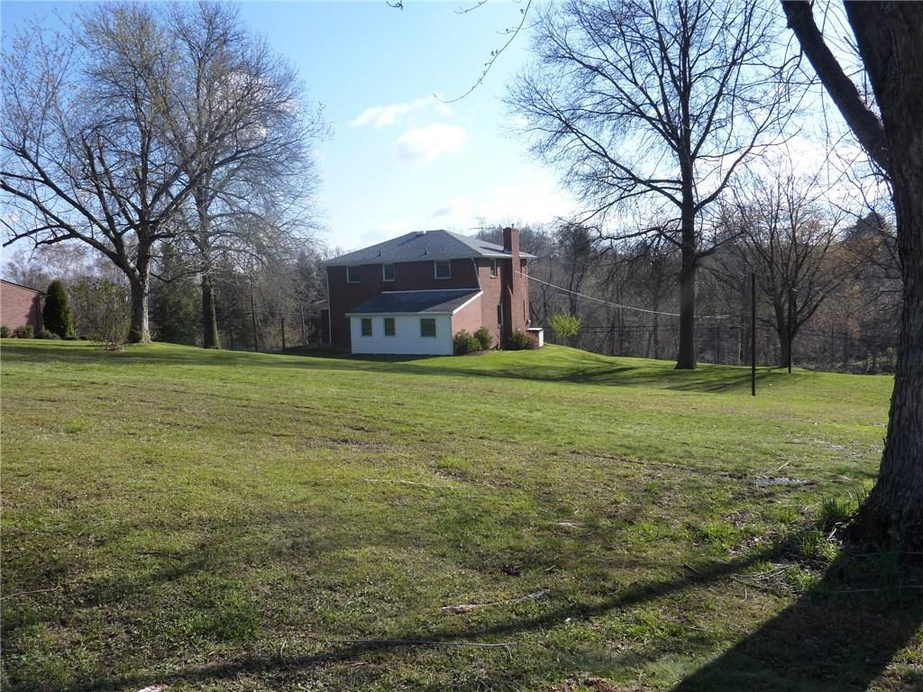 The view from the "back forty" shows just how nice and level the rear is where the family spends all its time.