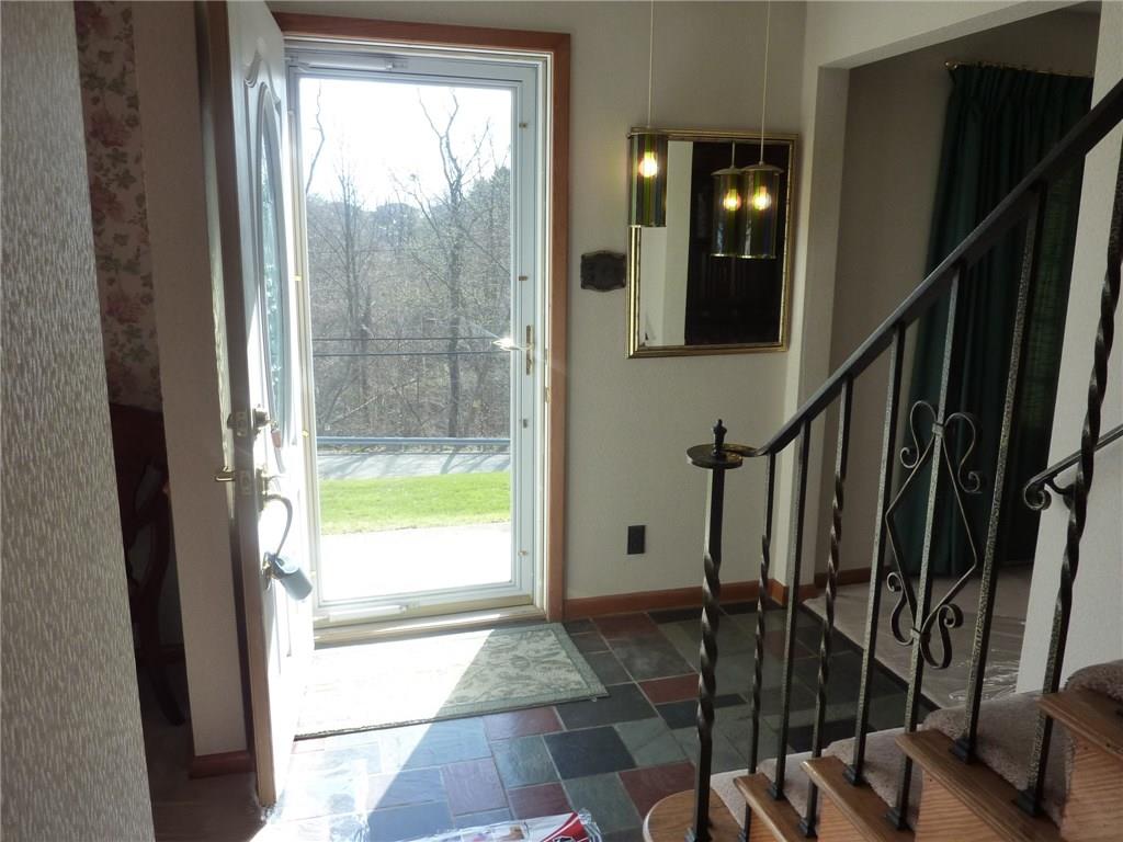 30 South Petrie Road Coraopolis, PA 15108 - Photo 21 of 25 The foyer has newer doors and as you can tell you don;t have to worry about looking out your front door and seeing a neighbor across teh street, you just get to enjoy the sunshine gleaming in!