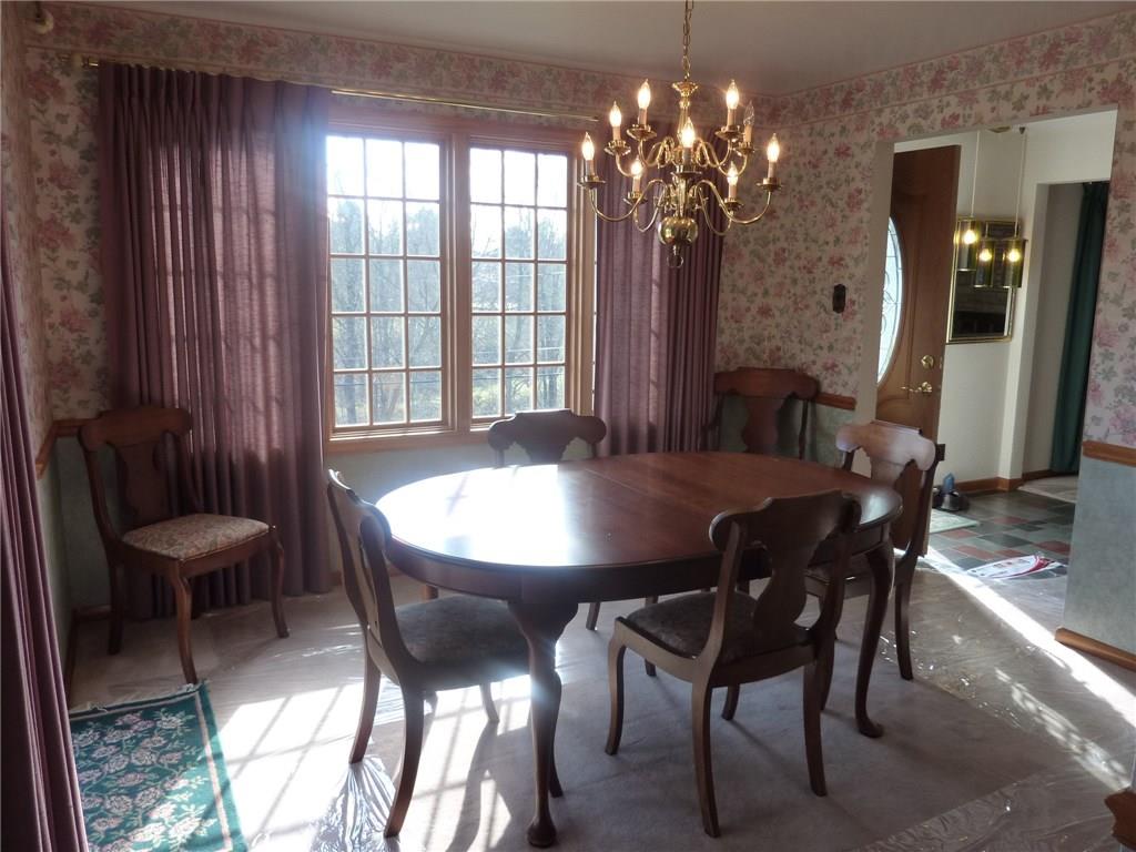30 South Petrie Road Coraopolis, PA 15108 - Photo 9 of 25 The spacious dining room has direct access to the front porch or teh kitchen for entertaining.