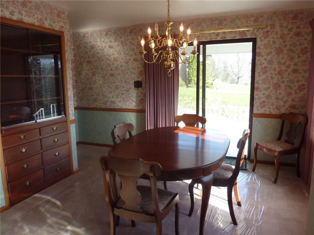 30 South Petrie Road Coraopolis, PA 15108 - Photo 10 of 25 The view from the other side of teh dining room shows the built-in cabinets and the easy access to the large covered porch.