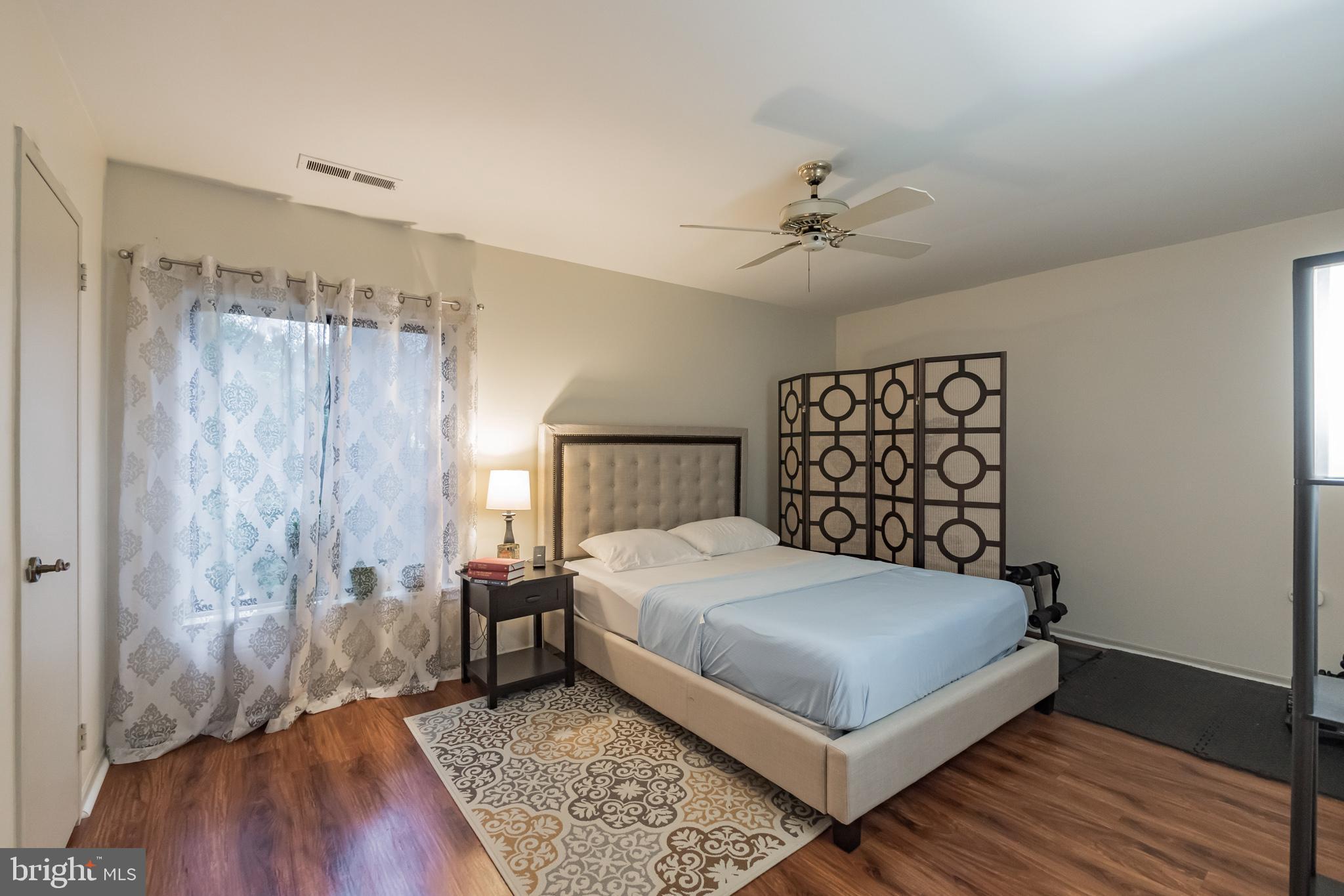 10020 Stedwick Road, Unit 304 Gaithersburg, MD 20886 - Photo 19 of 28 Large Primary Bedroom