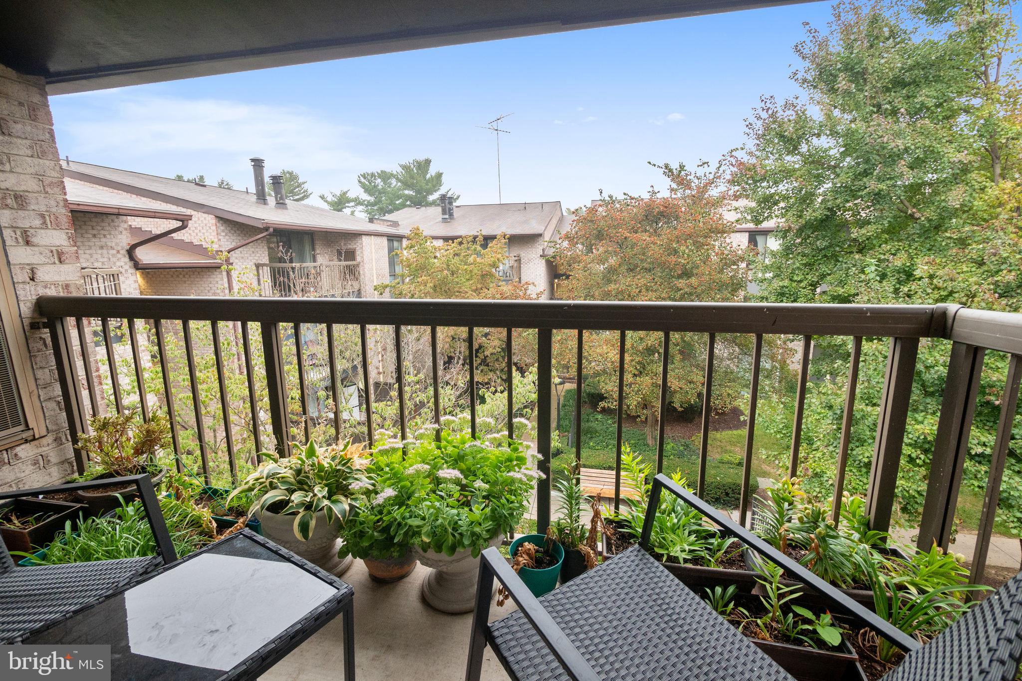 10020 Stedwick Road, Unit 304 Gaithersburg, MD 20886 - Photo 25 of 28 Balcony Overlooking Serene Courtyard