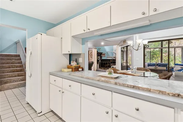 a view of storage and utility room with washer and dryer