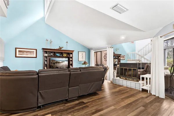 a kitchen with cabinets and appliances