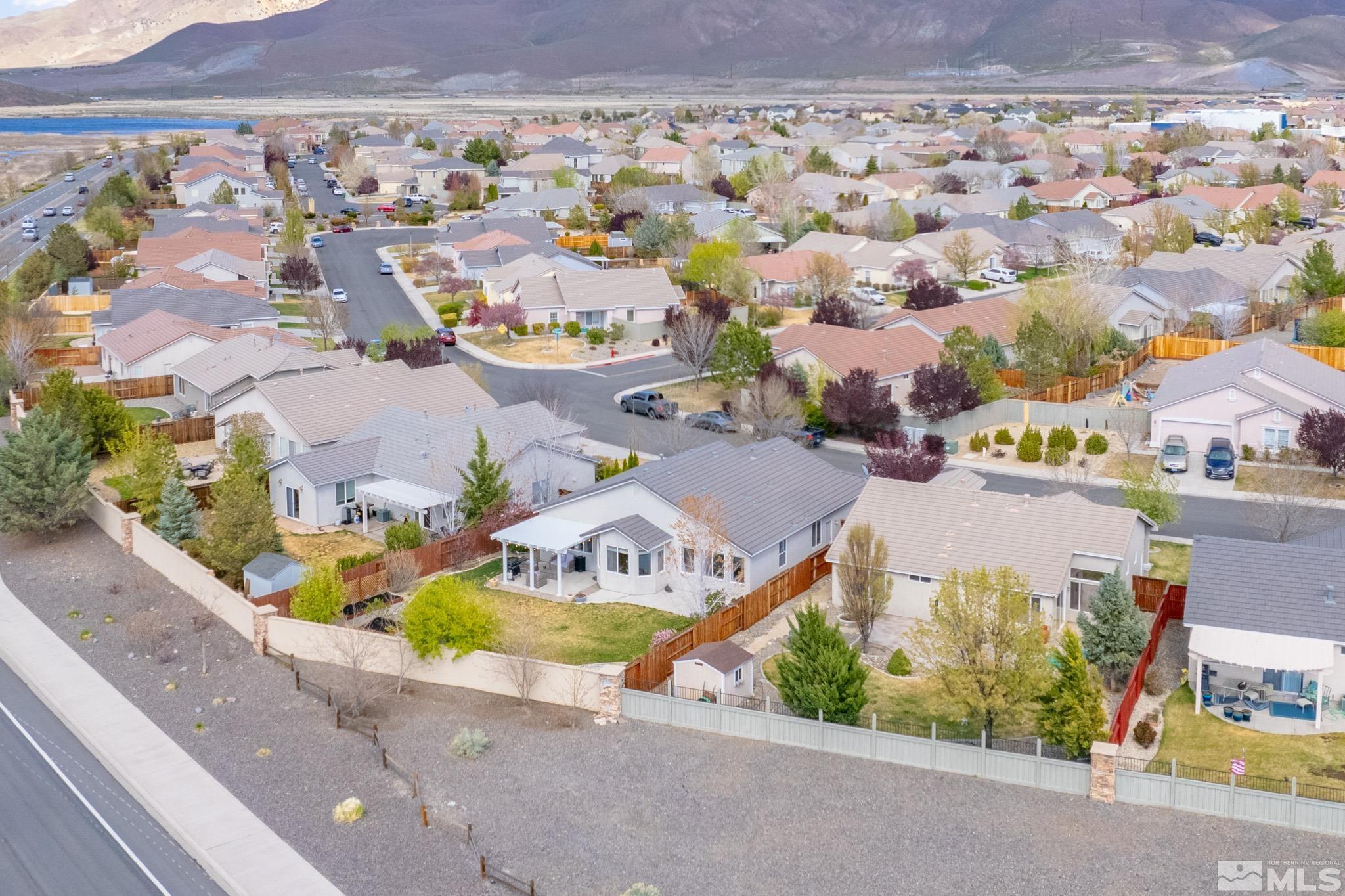1625 Canyonlands Way Reno, NV 89521 - Photo 29 of 31 an aerial view of a house with a garden and mountain