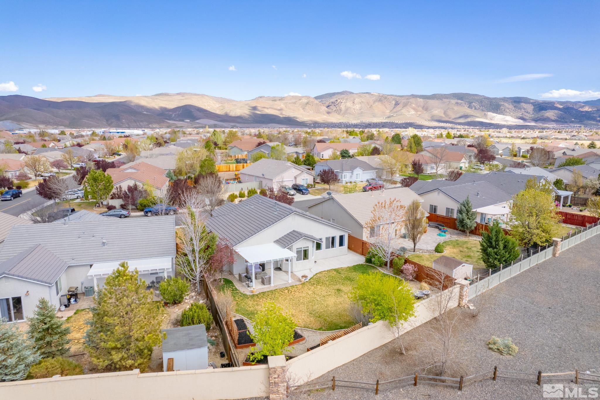1625 Canyonlands Way Reno, NV 89521 - Photo 31 of 31 an aerial view of residential houses with outdoor space