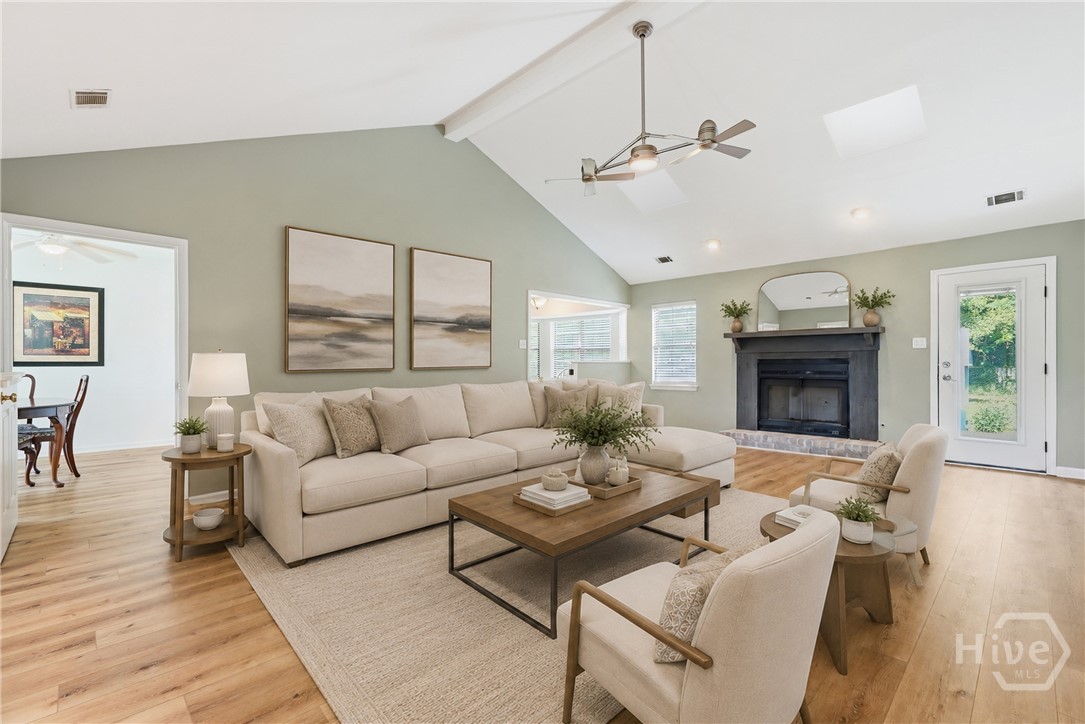 3 Rice Mill Drive Savannah, GA 31419 - Photo 4 of 37 Great room features cathedral ceilings and a cozy fire place. *images have been digitally enchanced.