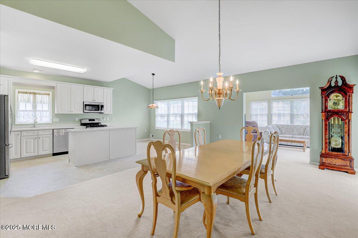 4 Long Bay Road Jackson, NJ 08527 - Photo 18 of 48 a view of a dining room with furniture and window