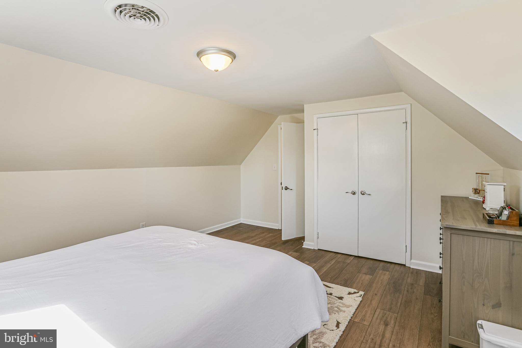 12702 Goodhill Road Silver Spring, MD 20906 - Photo 14 of 28 a bedroom with a bed and cabinets