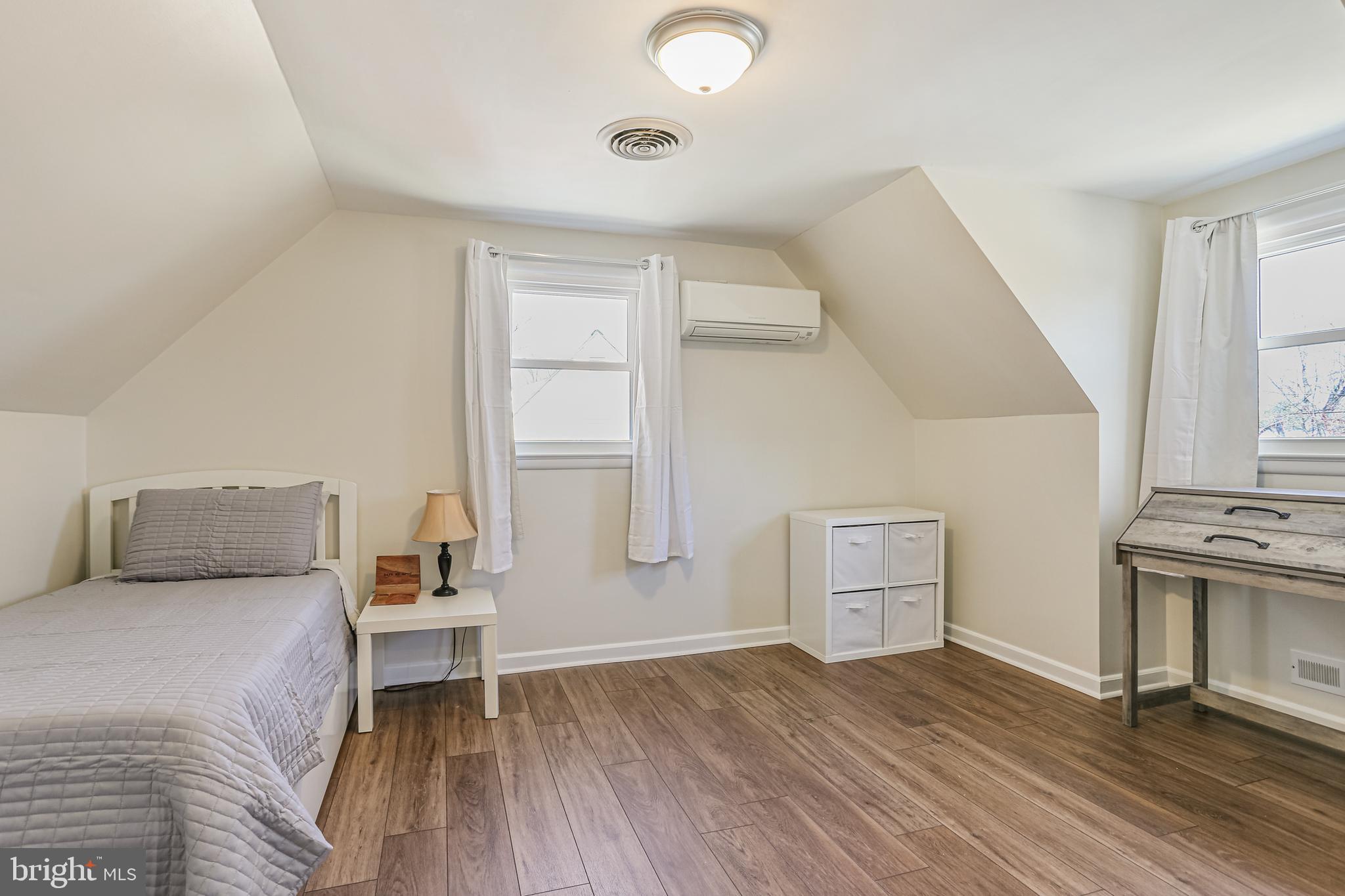 12702 Goodhill Road Silver Spring, MD 20906 - Photo 15 of 28 a living room with furniture and a wooden floor