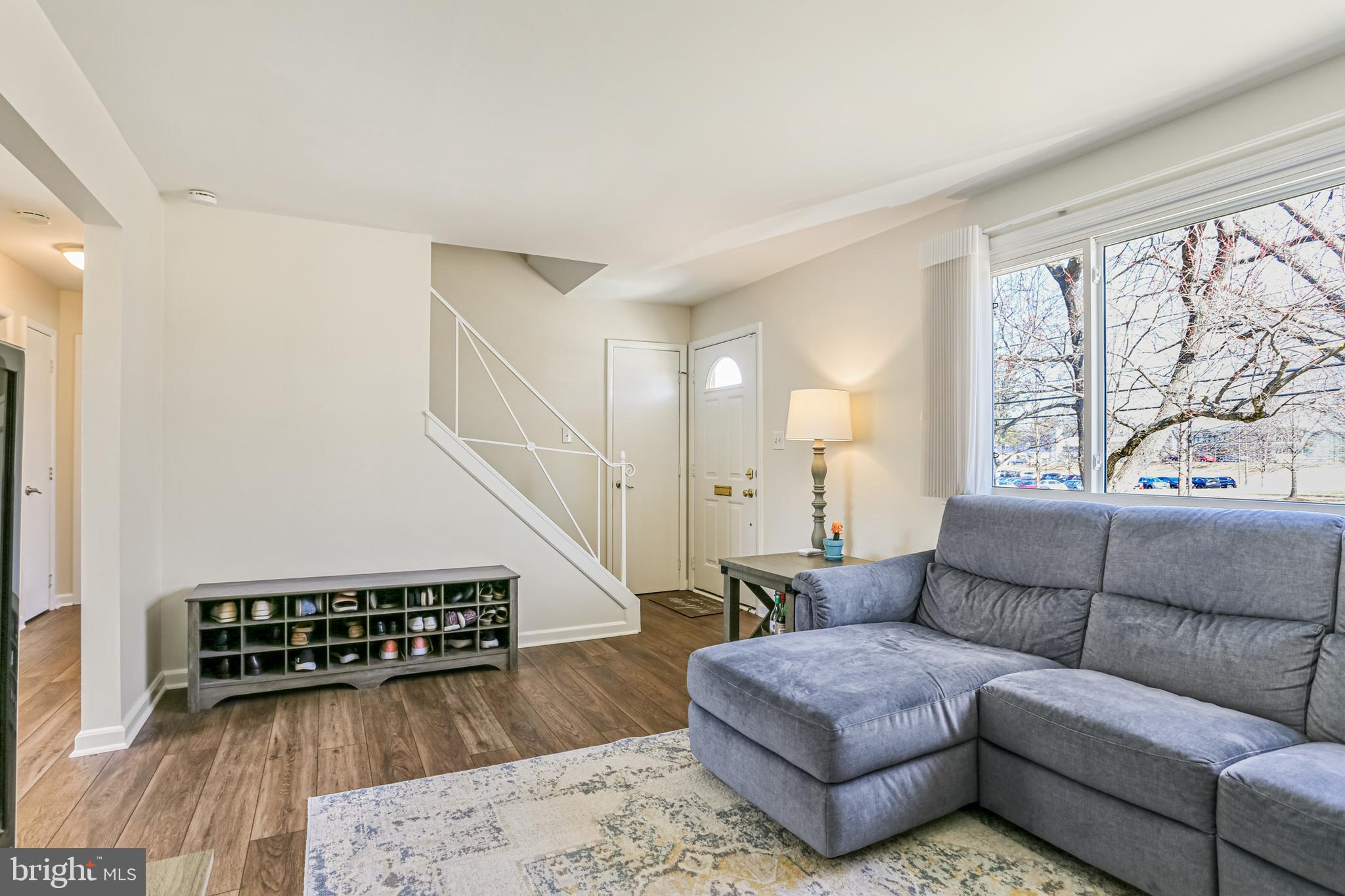 12702 Goodhill Road Silver Spring, MD 20906 - Photo 7 of 28 a living room with furniture and wooden floor