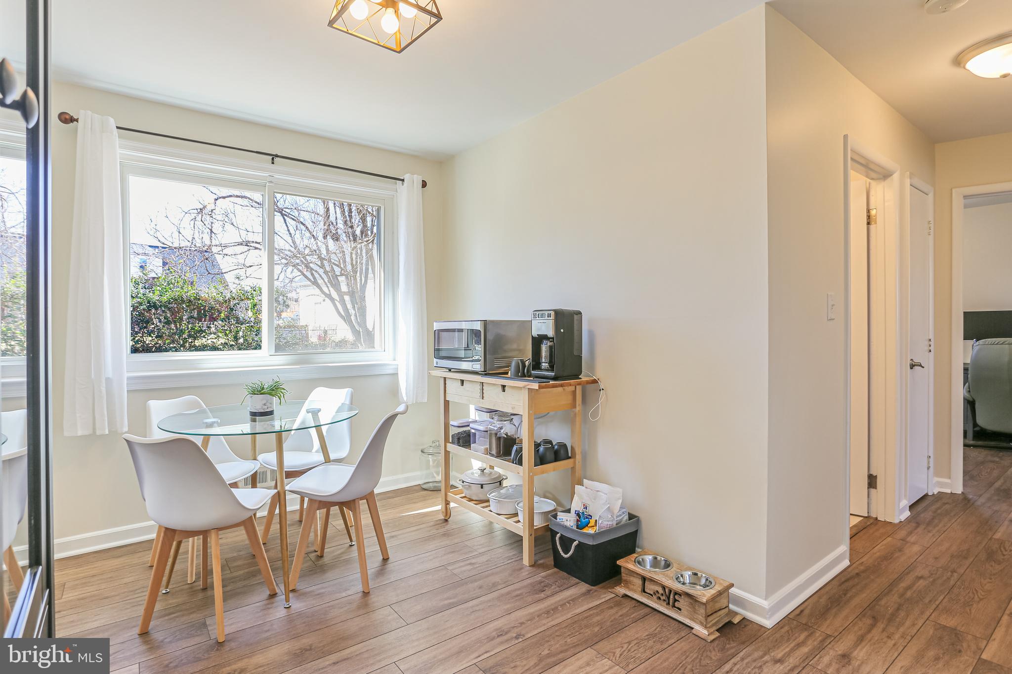 12702 Goodhill Road Silver Spring, MD 20906 - Photo 9 of 28 a dining room with furniture and a window