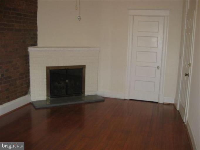 2714 Ontario Road Northwest Washington, DC 20009 - Photo 11 of 20 Bedroom w/fireplace and access to solarium