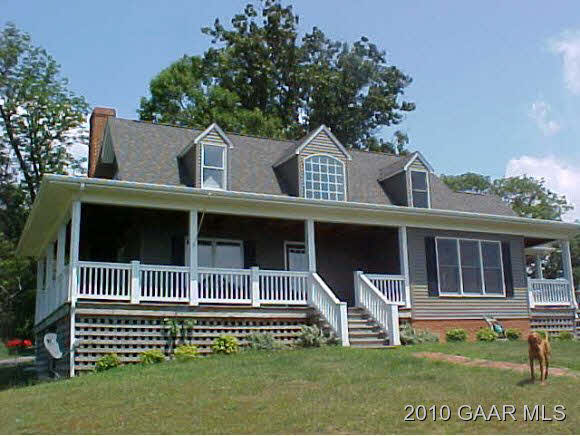 51 Haytie Road Swoope, VA 24479 - Photo 1 of 12 a front view of a house with a garden