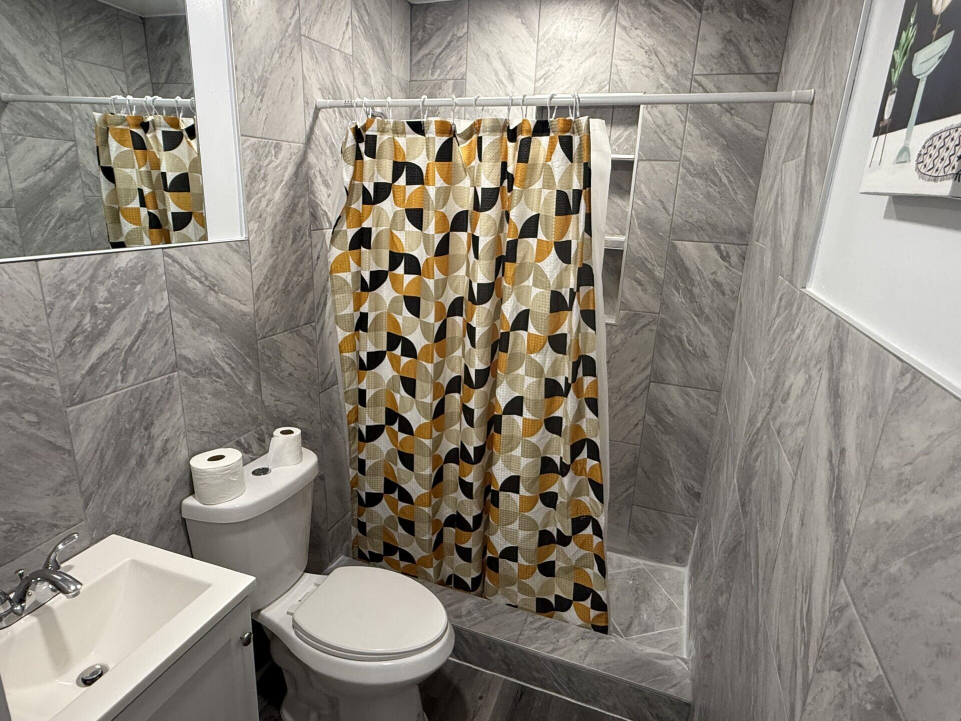 131 East 27th Street, Unit 6 Riviera Beach, FL 33404 - Photo 10 of 14 Upstairs Bathroom