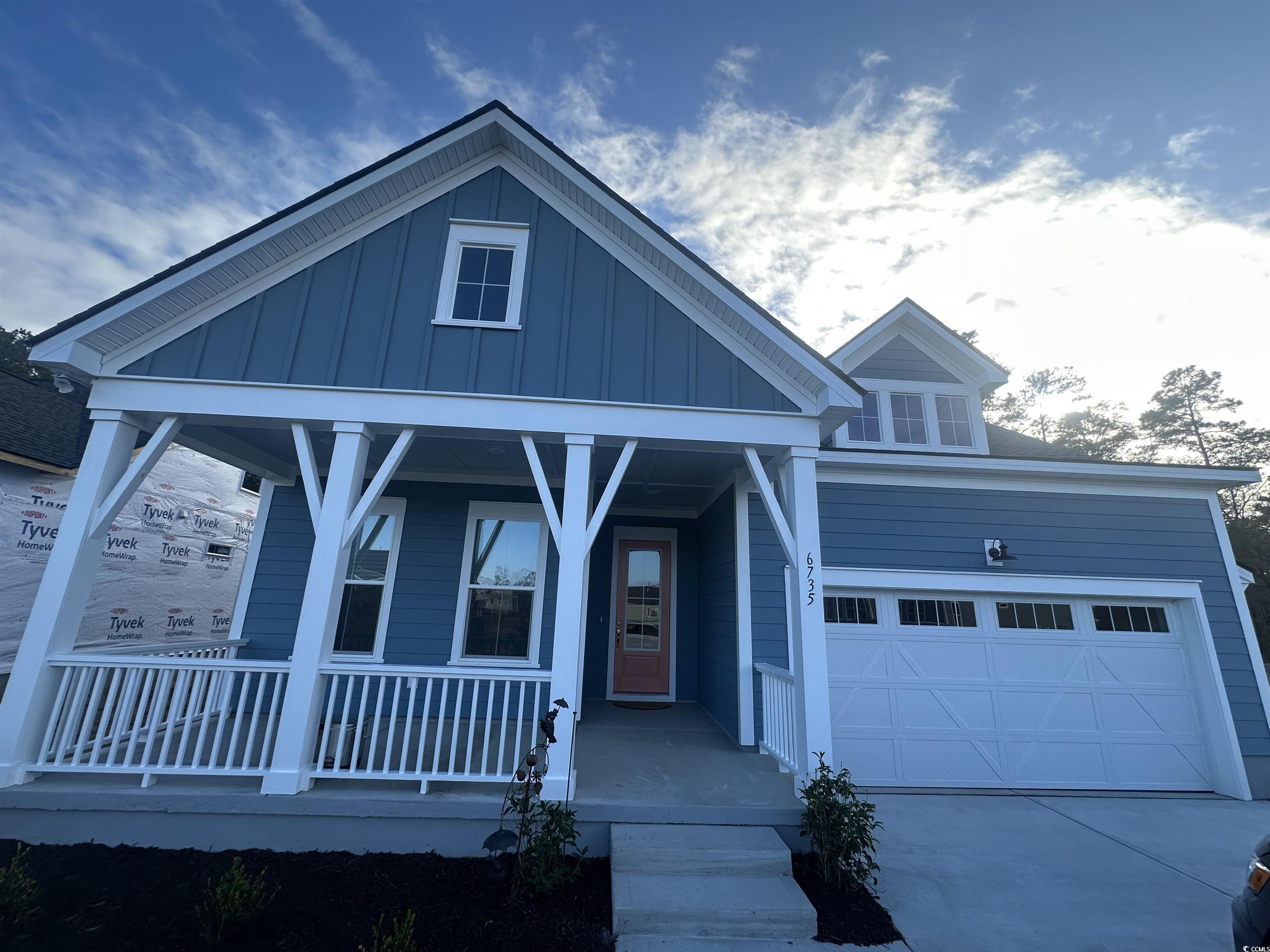 6735 Genesis Drive Murrells Inlet, SC 29576 - Photo 1 of 2 View of front of property featuring a porch and a