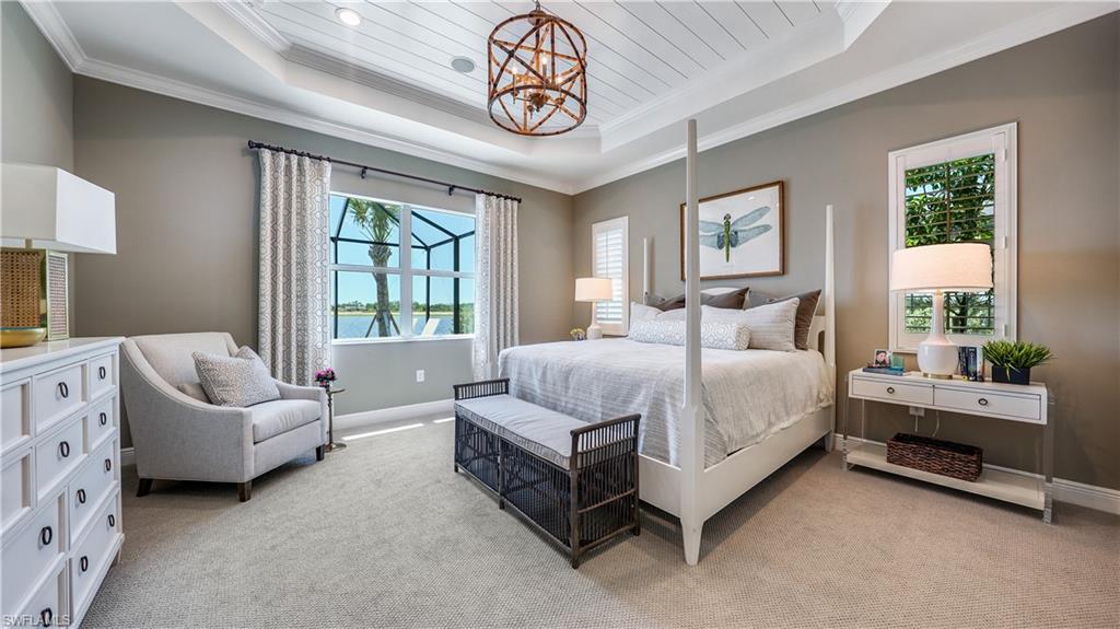 3992 Skysail Drive Naples, FL 34120 - Photo 11 of 12 a bed room with a bed and a two chairs