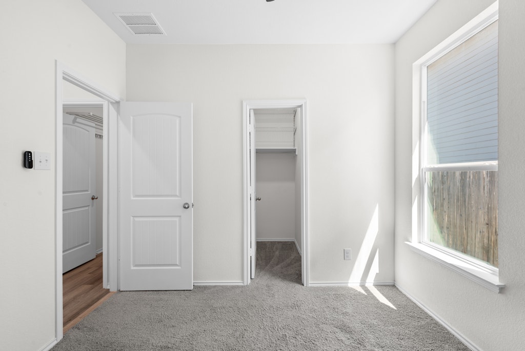 438 Thunder Valley Trail Georgetown, TX 78626 - Photo 14 of 21 a view of an empty room with a window