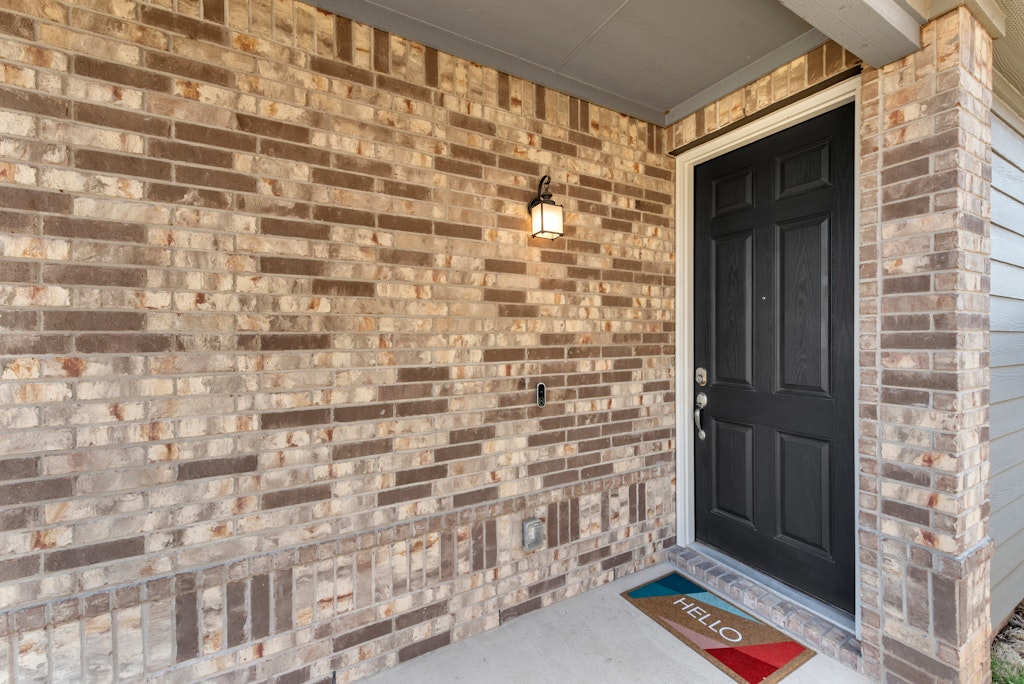 438 Thunder Valley Trail Georgetown, TX 78626 - Photo 20 of 21 a bathroom with a door