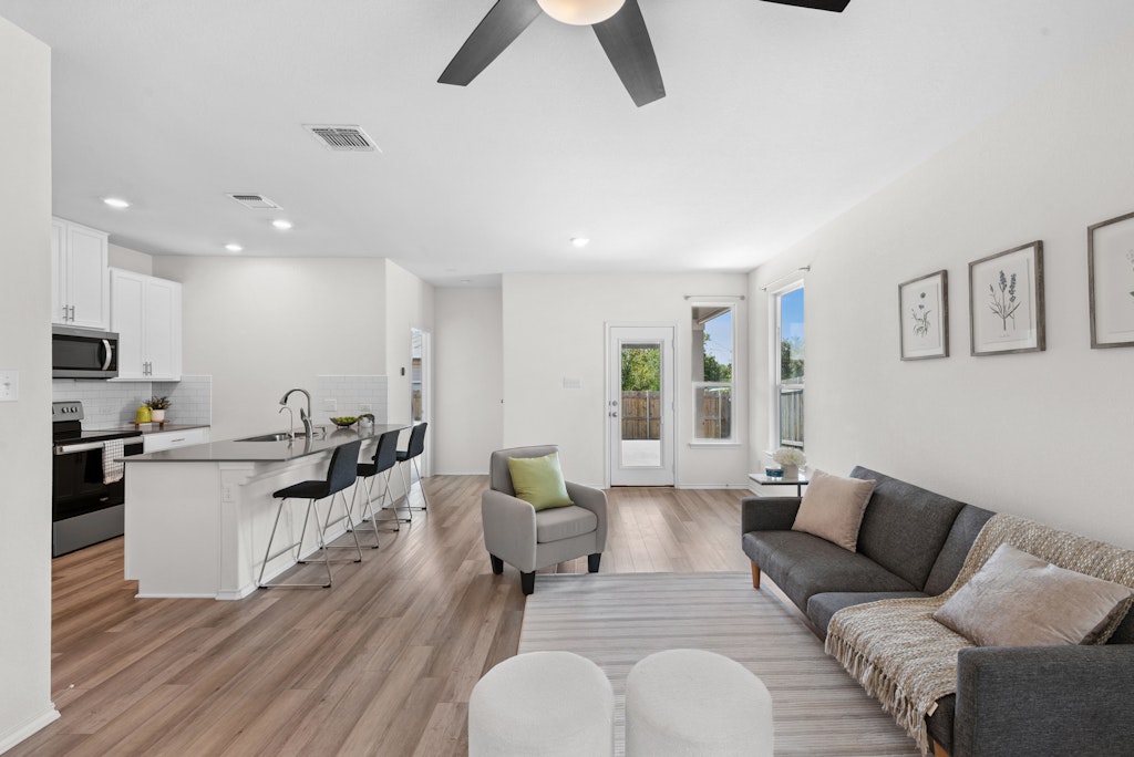 438 Thunder Valley Trail Georgetown, TX 78626 - Photo 21 of 21 a living room with furniture and view of kitchen