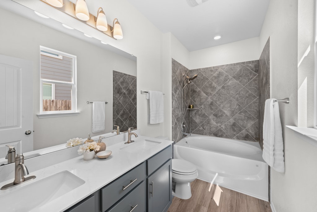 438 Thunder Valley Trail Georgetown, TX 78626 - Photo 9 of 21 a bathroom with a sink a toilet and shower